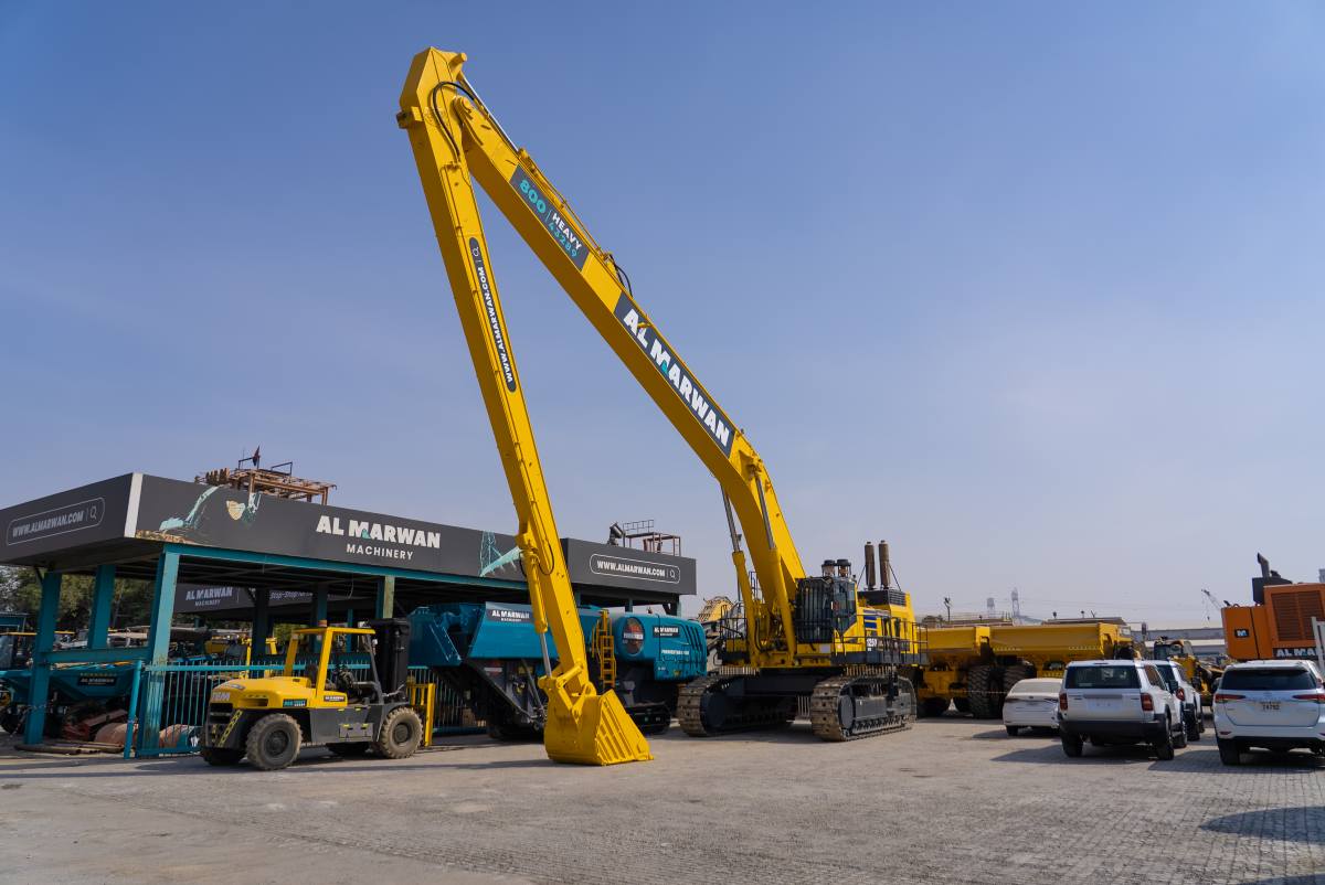 The massive long boom Komatsu PC1250 Excavator