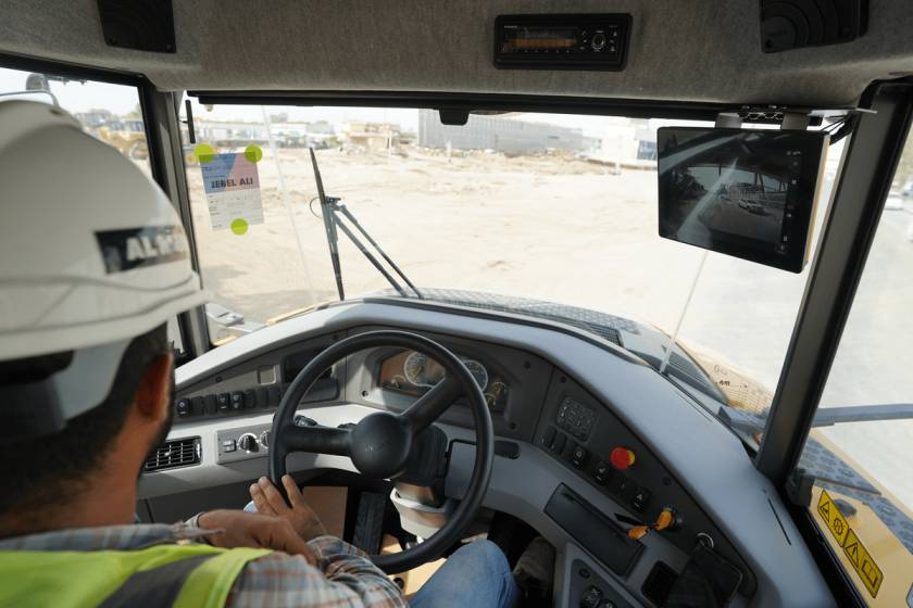 An Al Marwan Heavy Machinery operator driving a brand-new Volvo A40G dump truck equipped with latest CARETRACK monitoring system
