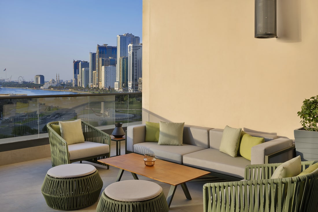 Terrace at Majdolin Restaurant offers panoramic views over the Al Majaz Park and Waterfront