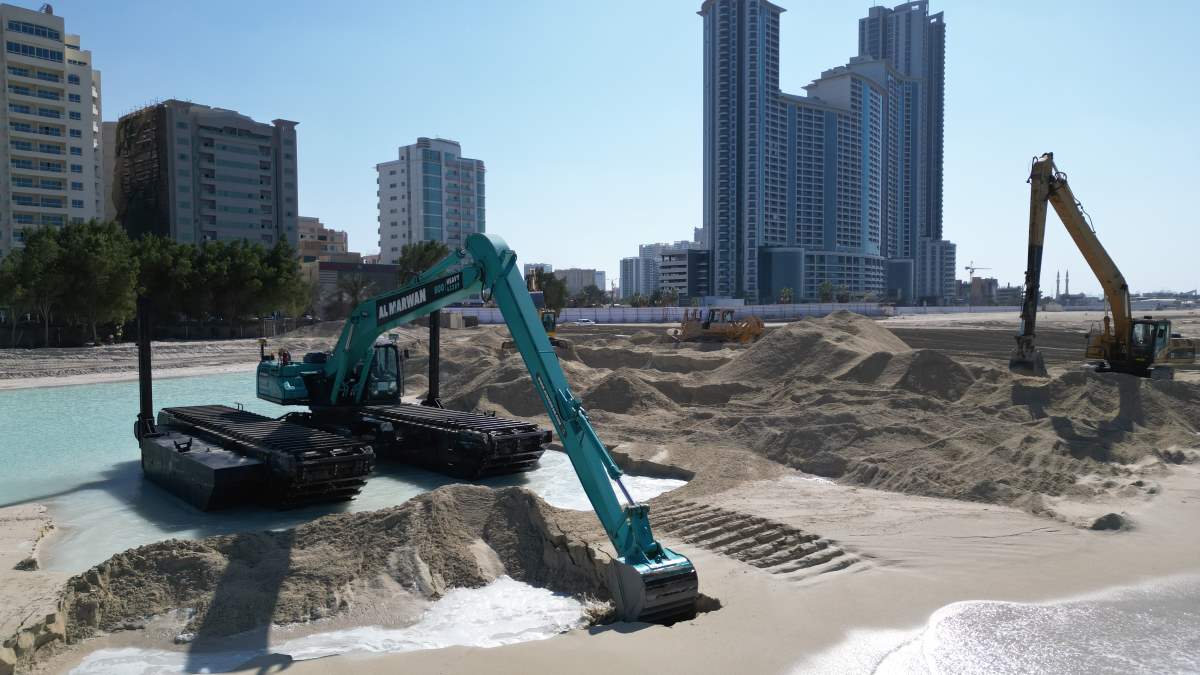 Amphibious SK380 excavator in action.