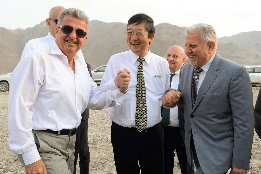 A picture of the President of Komatsu with Founder and Co-Founder of Al Marwan Group