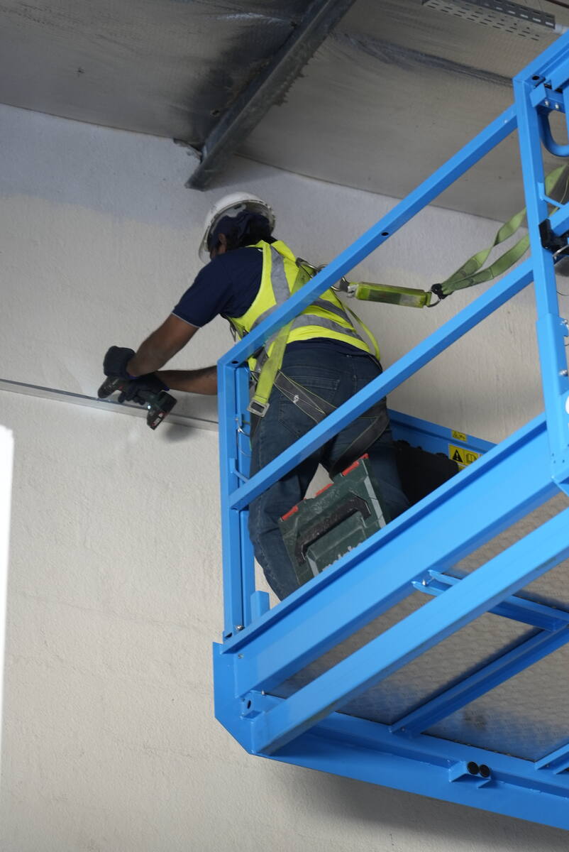 Proper use of a safety harness with a lanyard